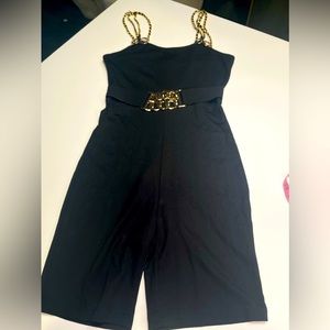 NWOT- Fashion Nova Woman Black Belted
Chian Straps Romper L